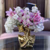 Beautiful handmade floral vase set up with beautiful fresh flowers. This is