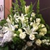 traditional funeral basket all white flowers with touch of greens