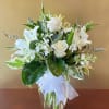 White flowers have a certain timelessness and peaceful perfection.
This hand-gathered arrangement includes