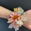 Silk flower wrist corsage.  This is a one of a kind