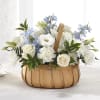 Share your heartfelt loss with this fresh, handcrafted arrangement of white carnations