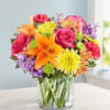 Like a warm embrace, our vibrant bouquet delivers your sentiments to someone