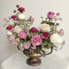A tapestry of rich pinks marries modern design with an old word-style