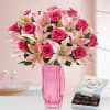 12 pink roses and 6 pink lilis 