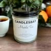 A handcrafted scented soy blend candle at our store. The candle is