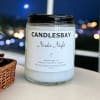 A handcrafted scented soy blend candle at our store. The candle is