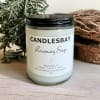 A handcrafted scented soy blend candle at our store. The candle is