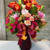 This vibrant floral arrangement is a celebration of love and passion 