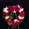 A loving way to say farewell, this heart wreath can be customized