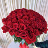 Celebrate love&#039;s symphony with this breathtaking bouquet of 50 radiant red roses.