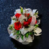 A beautiful, simple, elegant corsage with one complement color of ribbon and