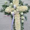 it is made with:
30 white mums
12 white roses
2 baby breath
greens 
eucalyptus
white bow
