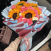 Lovely sunflower mix with pretty pink carnation mix for any occasion.
