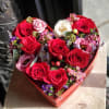 Beautiful flowers in a heart-shaped box to express your love.

* Color of