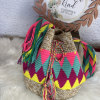 Wuayuu backpack made with acrylic threads, fine cotton and brightly colored yarns