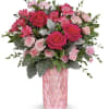 With its intricate diamond-cut design and pretty pink hue, this amazing glass