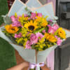 Lavander Roses, Sunflowers, and Lavander Daisies with Solidago and Eucalyptus accents. 
Paper