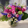 Exotic flowers excellently arranged with various colors of roses giving a wonderful