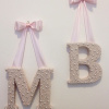 Read the full description
Materials: Acrylic pearls, adhesive, wooden letter
Beautiful wooden letter covered