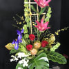 Mixed flowers surrounded by bamboo arbor