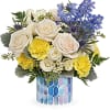 Like wispy clouds in a bright blue sky, this beautiful bouquet of