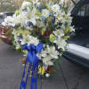 18 inch open heart, cusom decorated using a combination of Mums, lilies&nbsp;