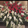 Grand upscale casket spread that sits on top of the casket during
