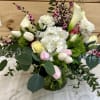 Mixed flowers of soft pinks and whites
Tulips, roses, hydrangeas of all soft