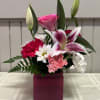 This arrangements of pink and white is sure to put a smile