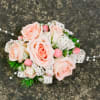 Select this corsage of peach spray roses, pink hypericum, lace ribbon and