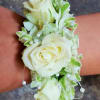 Select this lovely and unique bracelet with white spray roses and white