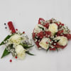 Select this bold and beautiful boutonniere set featuring spray roses, babies breathe