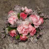 Select this corsage of pink mini carnations and pink spray roses.
ALL PROM