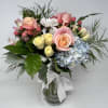Our enchanting &quot;Whispers of Pastel&quot; floral arrangement, designed to capture the soft
