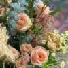 The &quot;Pastel Grand Bouquets&quot; are full of peach and baby yellow accents.

