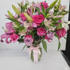 it is made with:
3 pink lilies
6 hot pink roses
4 lavender roses
6 pink