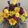 Brightful bouquet of yellow roses, sunflowers, lavender dianthus, mix of mums with