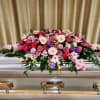 A stunning display of all shades of pinks to honor your loved