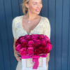Lovely roses in a box. From one glance, a smile appears not