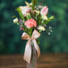 A simple and adorable bud vase. This arrangement contains Carnations, Tulip, Rose
