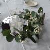 Beautiful fresh &quot;Silver Dollar&quot; eucalyptus &amp; baby&#039;s breath writhe around candleholders centerpiece