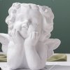 Add a sweet heavenly touch to any vignette with our Cherub Angel