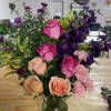 Celebrate good times with this lively bouquet. The arrangement includes roses, carnations
