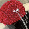 Bouquet  of 100 red roses, each petal a vibrant testament to