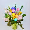 Colorful arrangements of hyacinths, Daffodils, Hypericum, Seeded Eucalyptus, Thistle Flower, colorful eggs