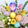Colorful arrangements of hyacinths, Daffodils, Hypericum, Seeded Eucalyptus, Thistle Flower, colorful eggs