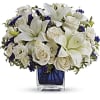 Like gazing into a clear blue sky, this serene arrangement soothes the