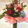 Mixed floral arrangement with roses, Hydrengea and a mix oin season blooms