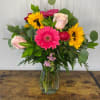 A Simple and tranquil arraignment  sunflowers, pink gerberas, pink roses, 