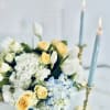 A picturesque blend of yellow and blue blossoms reminiscent of a serene